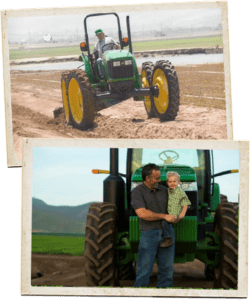 Rod Braga with child and tractor