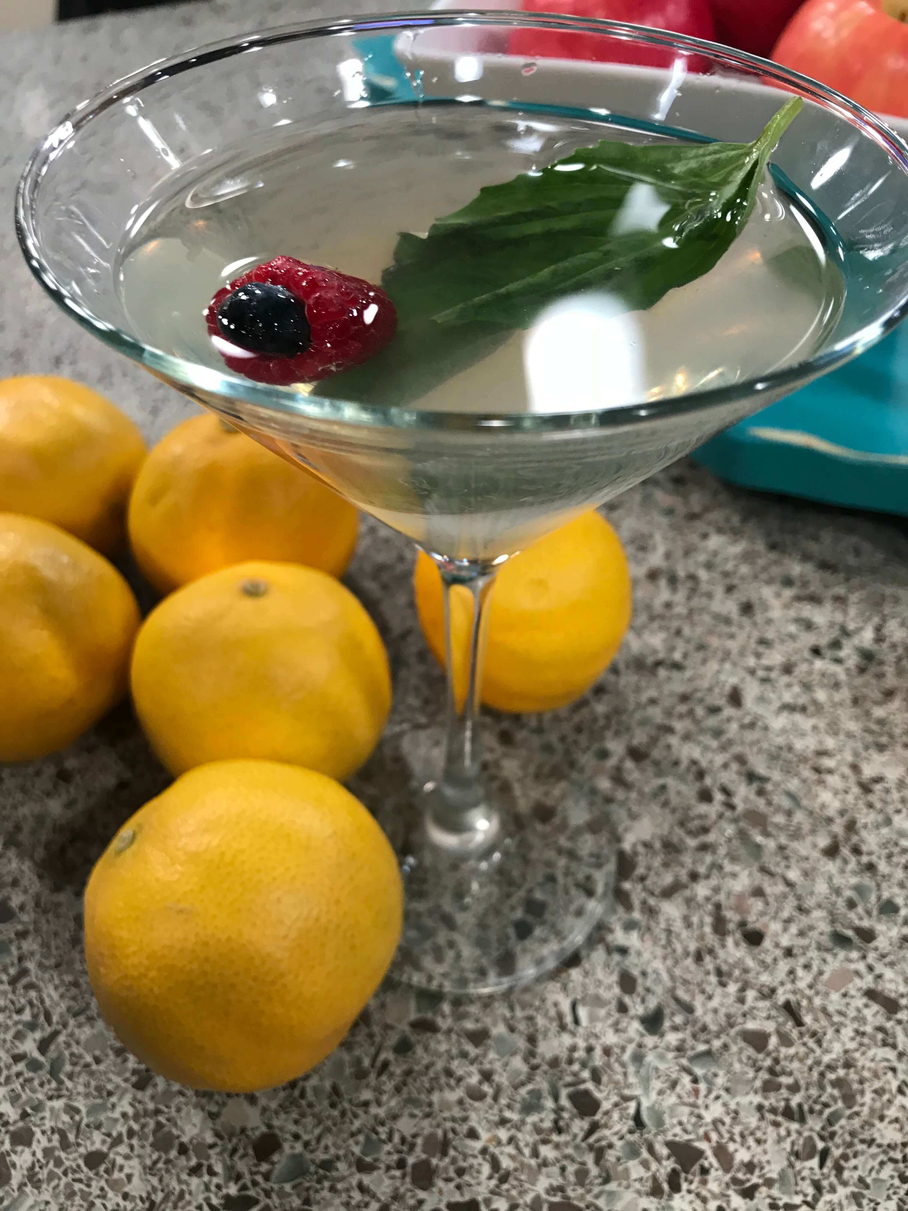 Sweet Lime Cocktail with Braspberry garnish